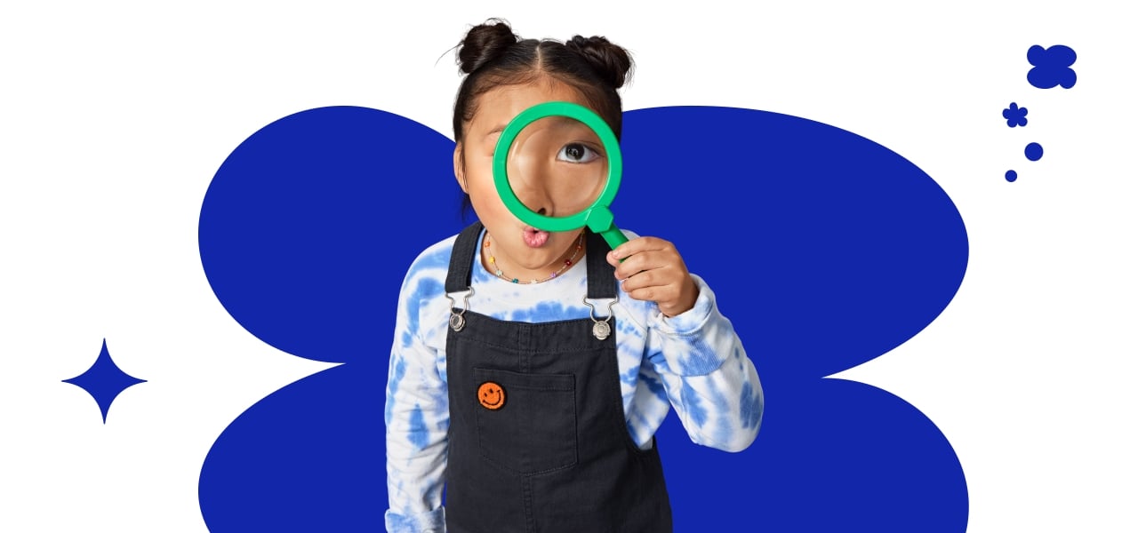 Little Girl with a magnifying glass