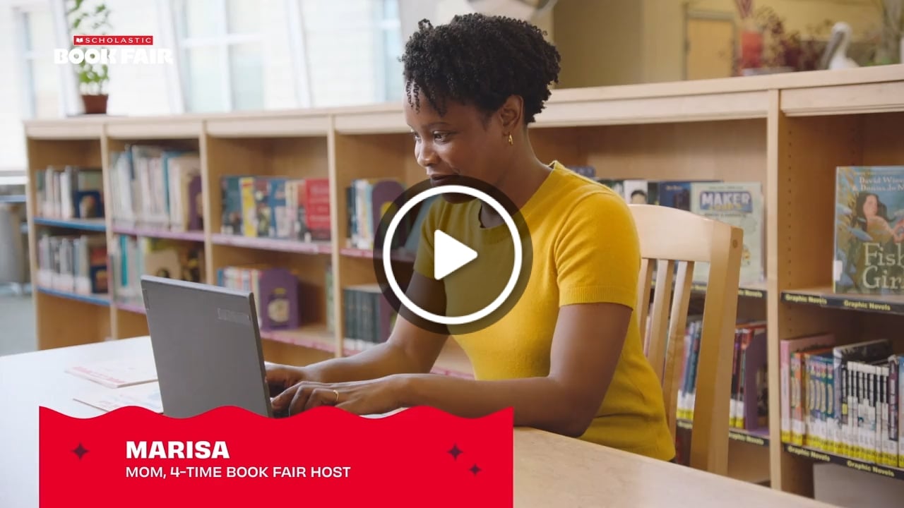 A Host searches on a laptop in a library 